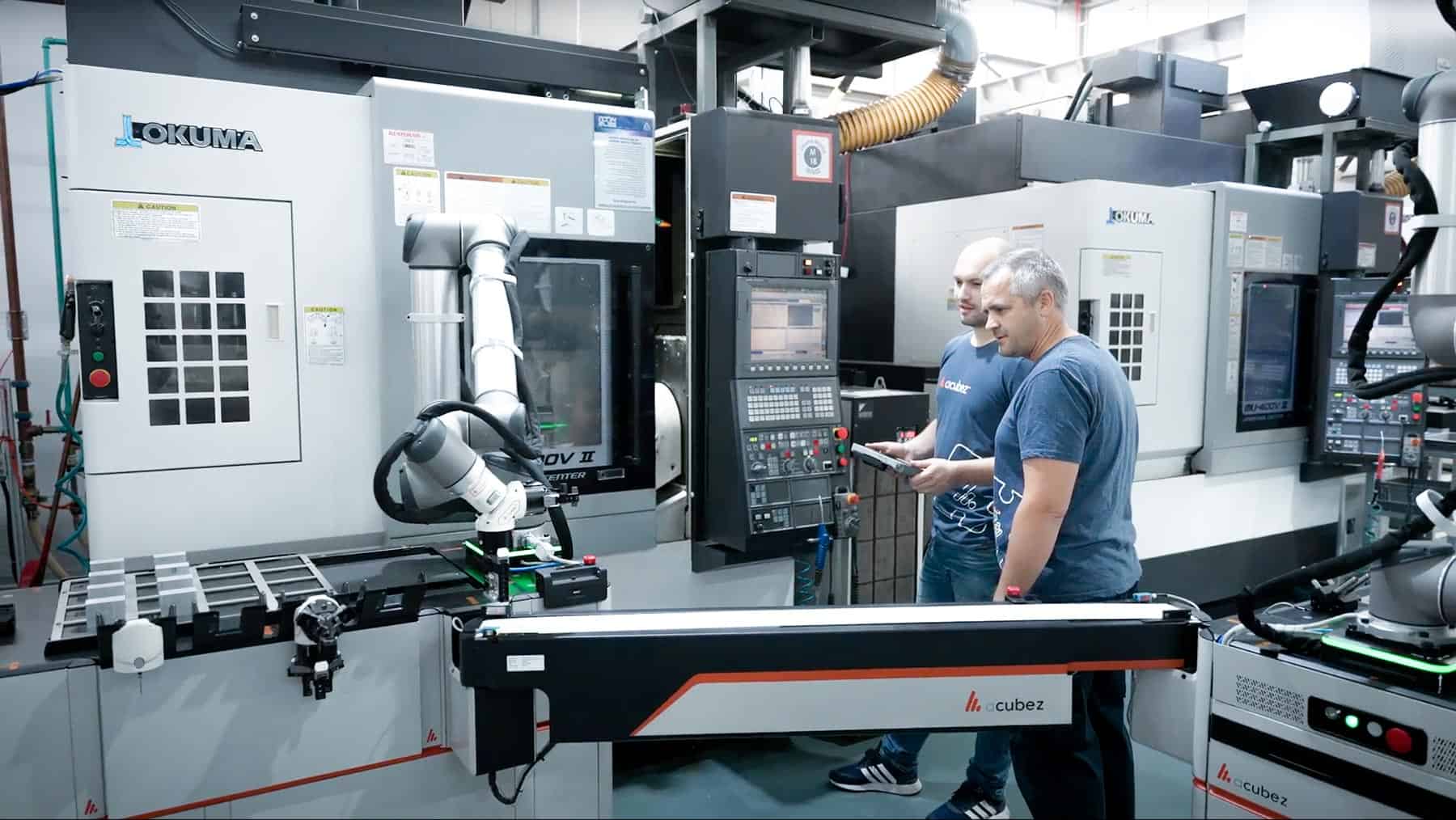 acubez™ CNC conveyor connecting two automation platforms